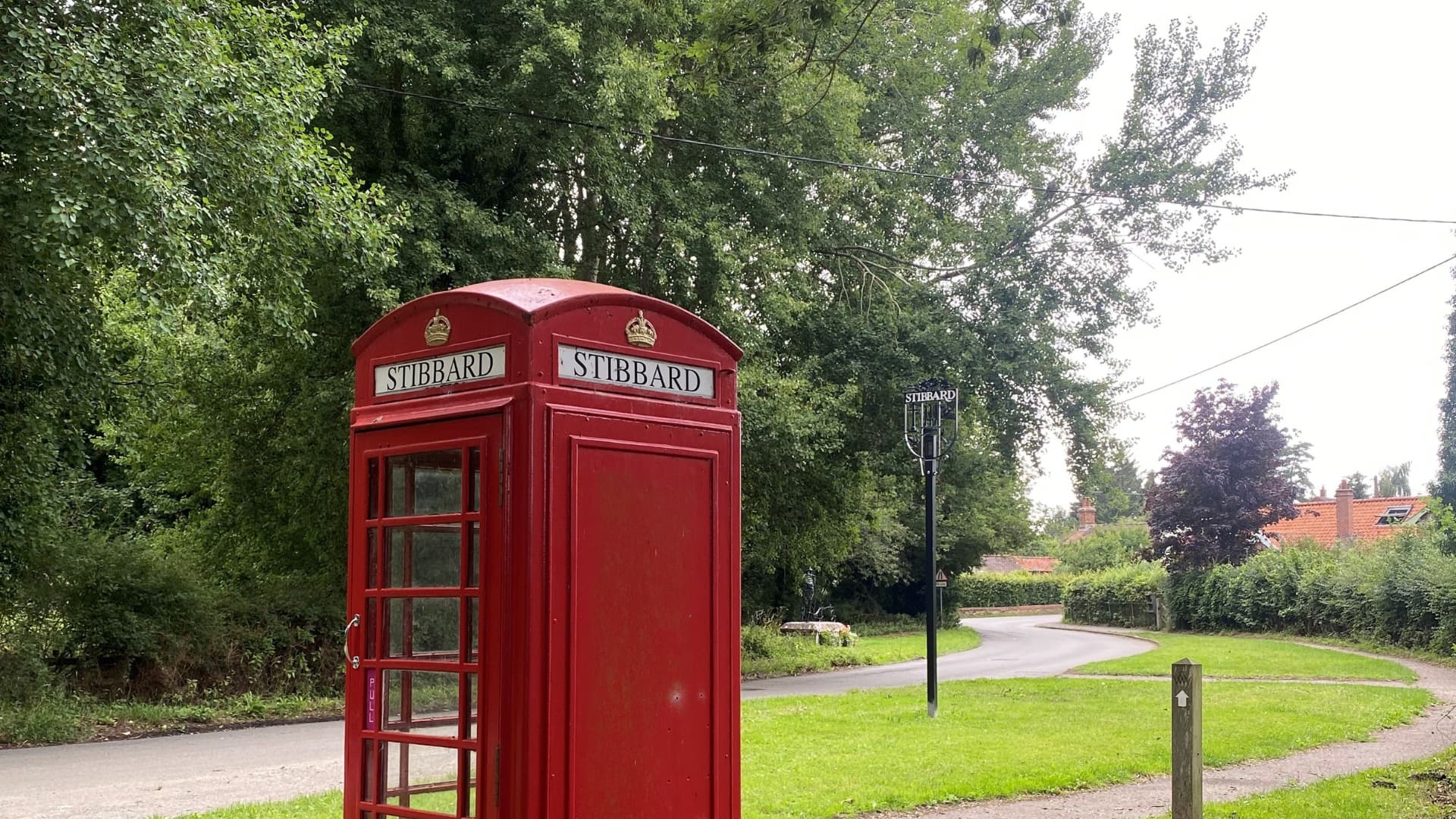 Phonebox and village sign